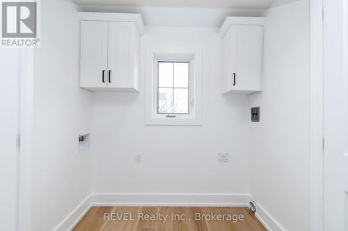 Convenient laundry located in upper level - 1129 Dipietro Street, Fort Erie (Lakeshore), ON - Indoor Photo Showing Other Room