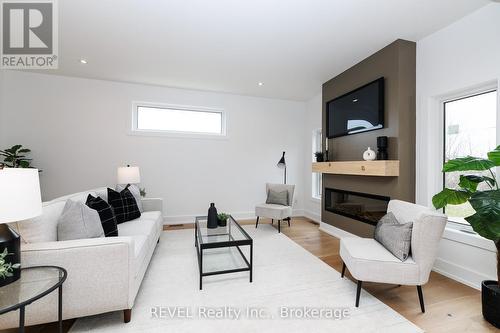 Living room seating area - 1129 Dipietro Street, Fort Erie (Lakeshore), ON - Indoor Photo Showing Living Room With Fireplace