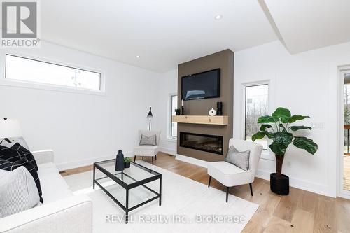1129 Dipietro Street, Fort Erie (Lakeshore), ON - Indoor Photo Showing Living Room With Fireplace