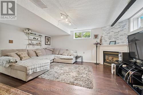 18 Pearwood Court, Kitchener, ON - Indoor Photo Showing Living Room With Fireplace