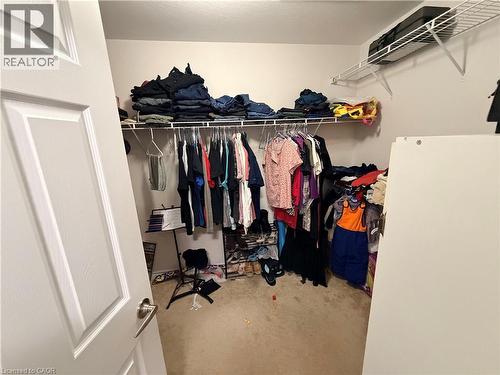 View of walk in closet - 31 Sofitel Drive, Kitchener, ON - Indoor With Storage
