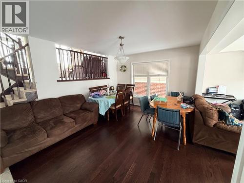Living room featuring wood finished floors and stairway - 31 Sofitel Drive, Kitchener, ON - Indoor Photo Showing Living Room