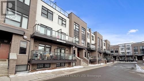 416 - 1577 Rose Way, Milton, ON - Outdoor With Balcony With Facade