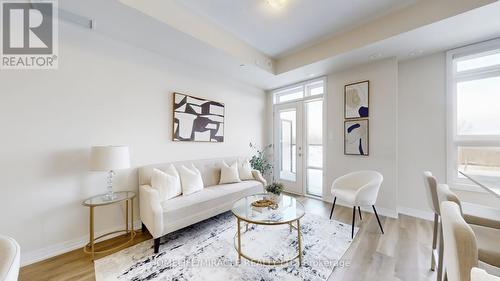 416 - 1577 Rose Way, Milton, ON - Indoor Photo Showing Living Room