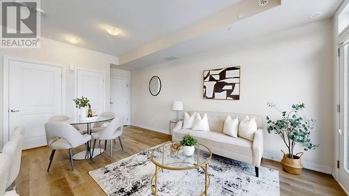 416 - 1577 Rose Way, Milton, ON - Indoor Photo Showing Living Room