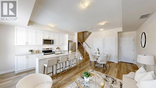 416 - 1577 Rose Way, Milton, ON - Indoor