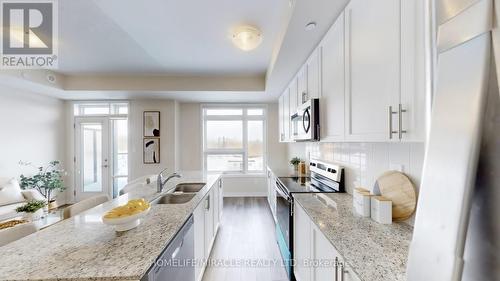 416 - 1577 Rose Way, Milton, ON - Indoor Photo Showing Kitchen With Double Sink With Upgraded Kitchen