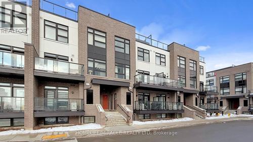 416 - 1577 Rose Way, Milton, ON - Outdoor With Balcony With Facade