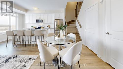416 - 1577 Rose Way, Milton, ON - Indoor Photo Showing Dining Room