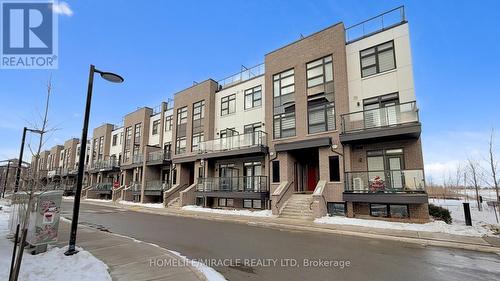 416 - 1577 Rose Way, Milton, ON - Outdoor With Balcony With Facade