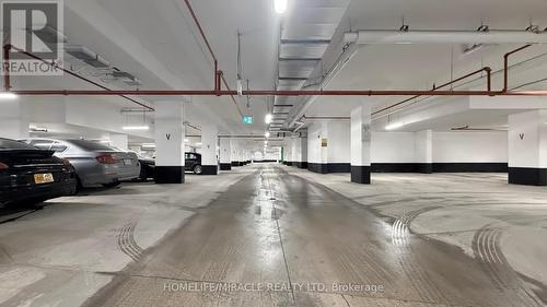 416 - 1577 Rose Way, Milton, ON - Indoor Photo Showing Garage