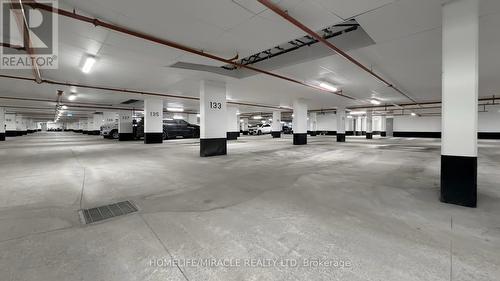 416 - 1577 Rose Way, Milton, ON - Indoor Photo Showing Garage