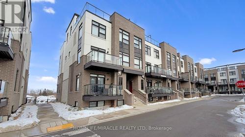 416 - 1577 Rose Way, Milton, ON - Outdoor With Facade