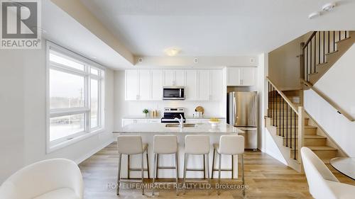 416 - 1577 Rose Way, Milton, ON - Indoor Photo Showing Kitchen
