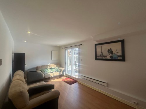 Salle familiale - 180 Place Terry-Fox, Kirkland, QC - Indoor Photo Showing Living Room