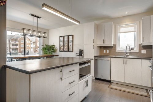Kitchen - 101-3125 Boul. De La Gare, Vaudreuil-Dorion, QC - Indoor Photo Showing Kitchen With Double Sink