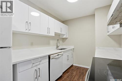 203 311 Tait Crescent, Saskatoon, SK - Indoor Photo Showing Kitchen With Double Sink
