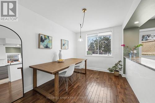 Dining room w expansive window & hanging fixture. - 12 Stevenson Avenue, Ottawa, ON - Indoor Photo Showing Other Room