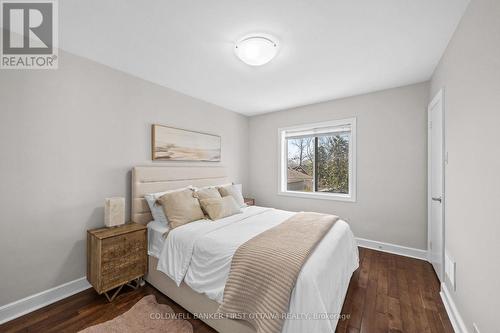 Primary bedroom window and walk in closet! - 12 Stevenson Avenue, Ottawa, ON - Indoor Photo Showing Bedroom
