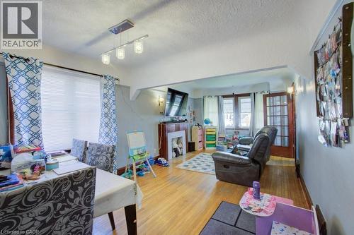 34 Barons Avenue S, Hamilton, ON - Indoor Photo Showing Living Room With Fireplace