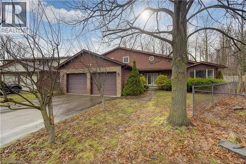 Ranch-style house featuring an attached garage and concrete driveway - 190 Silvercrest Drive, Waterloo, ON - Outdoor