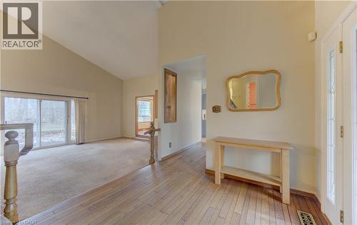 Entrance foyer featuring light wood-style flooring, light colored carpet, and vaulted ceiling - 190 Silvercrest Drive, Waterloo, ON - Indoor Photo Showing Other Room
