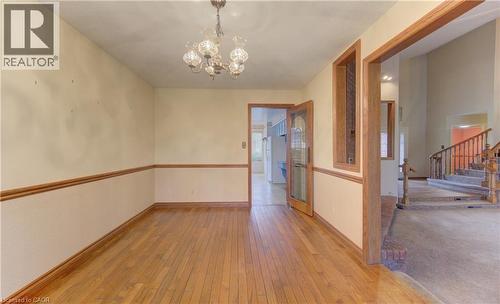 Unfurnished room featuring hanging lights and light wood-style flooring - 190 Silvercrest Drive, Waterloo, ON - Indoor Photo Showing Other Room