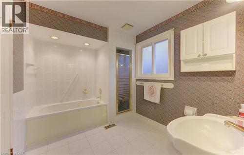 Bathroom featuring wallpapered walls, a bath, a shower stall, and light tile patterned floors - 190 Silvercrest Drive, Waterloo, ON - Indoor Photo Showing Bathroom