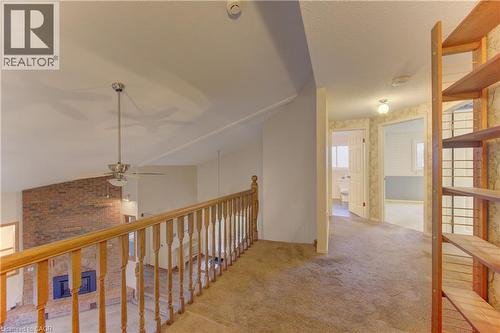 Hall featuring light carpet, wallpapered walls, and a textured ceiling - 190 Silvercrest Drive, Waterloo, ON - Indoor Photo Showing Other Room