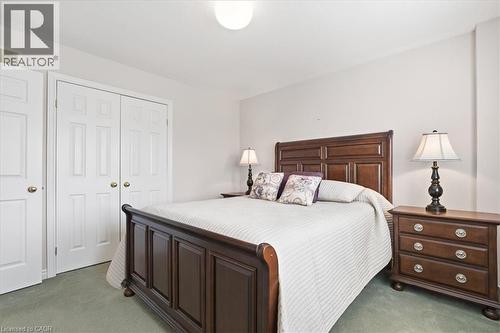 Carpeted bedroom featuring a closet - 54 Woodcrest Court, Kitchener, ON - Indoor Photo Showing Bedroom