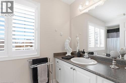 Bathroom with vanity and a shower with shower curtain - 54 Woodcrest Court, Kitchener, ON - Indoor Photo Showing Bathroom