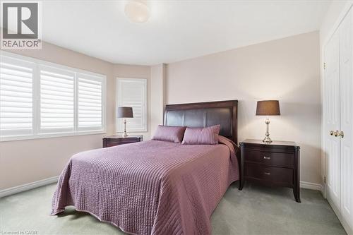 Bedroom featuring light colored carpet and a closet - 54 Woodcrest Court, Kitchener, ON - Indoor Photo Showing Bedroom