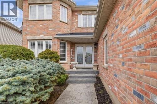 View of exterior entry featuring french doors and brick siding - 54 Woodcrest Court, Kitchener, ON - Outdoor