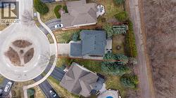 Aerial view of property and surrounding area featuring property parcel outlined - 