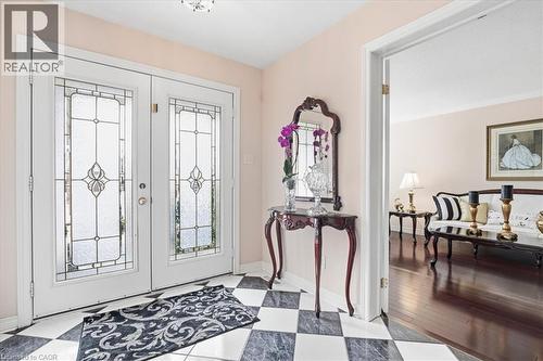 Foyer featuring french doors and baseboards - 54 Woodcrest Court, Kitchener, ON - Indoor Photo Showing Other Room
