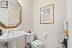 Bathroom featuring toilet and a sink - 