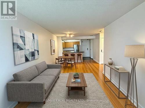 Virtually Staged - 712 - 350 Red Maple Road, Richmond Hill, ON - Indoor Photo Showing Living Room