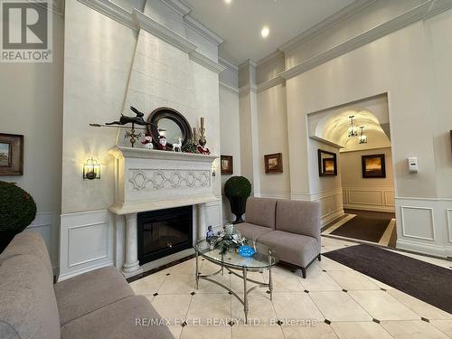 712 - 350 Red Maple Road, Richmond Hill, ON - Indoor Photo Showing Living Room With Fireplace