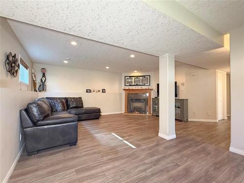110 Fraser Crescent, Brandon, MB - Indoor With Fireplace
