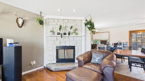 1321 16Th Street, Cranbrook, BC - Indoor Photo Showing Living Room With Fireplace