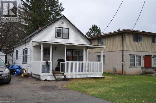 View of front of house with aluminium siding, a porch, and a front yard - 391 Lawrence Avenue, Kitchener, ON - Outdoor