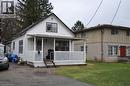 View of front of house with aluminium siding, a porch, and a front yard - 391 Lawrence Avenue, Kitchener, ON  - Outdoor 