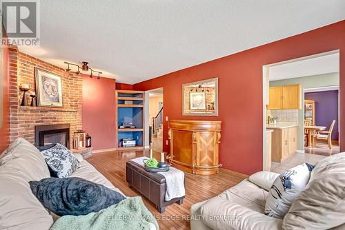 70 Strawberry Drive, Hamilton, ON - Indoor Photo Showing Living Room With Fireplace