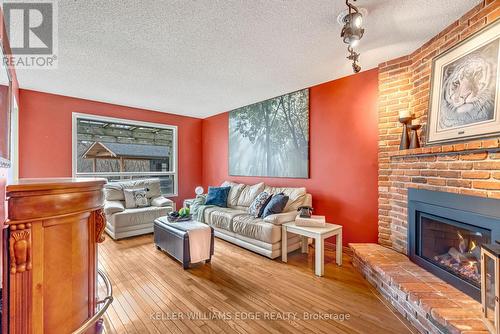 70 Strawberry Drive, Hamilton, ON - Indoor Photo Showing Living Room With Fireplace