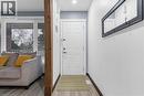 Doorway with baseboards and wood finished floors - 51 Independence Drive, Hamilton, ON  - Indoor Photo Showing Other Room 
