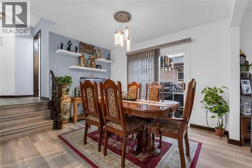 Dining room featuring light wood-style flooring and hanging lights - 51 Independence Drive, Hamilton, ON - Indoor Photo Showing Dining Room