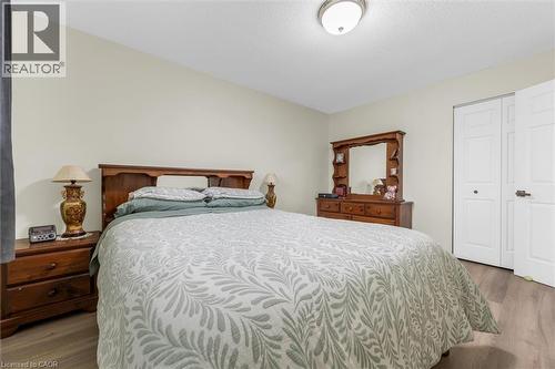 Bedroom featuring light wood-style floors and a closet - 51 Independence Drive, Hamilton, ON - Indoor Photo Showing Bedroom