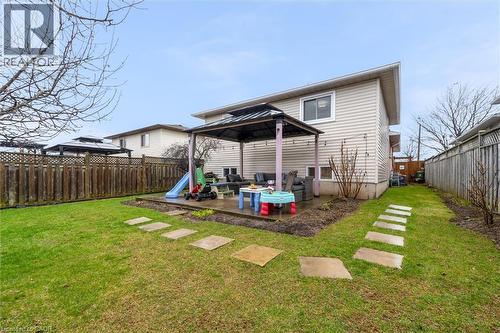 Back of property featuring a gazebo, a fenced backyard, and a patio area - 51 Independence Drive, Hamilton, ON - Outdoor