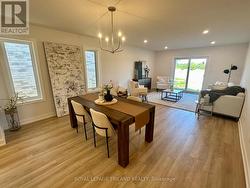 Spacious Dining and Great Room with Luxury Vinyl - 