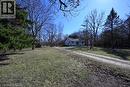 View of yard featuring dirt driveway - 1145 Main Street, Cambridge, ON  - Outdoor 